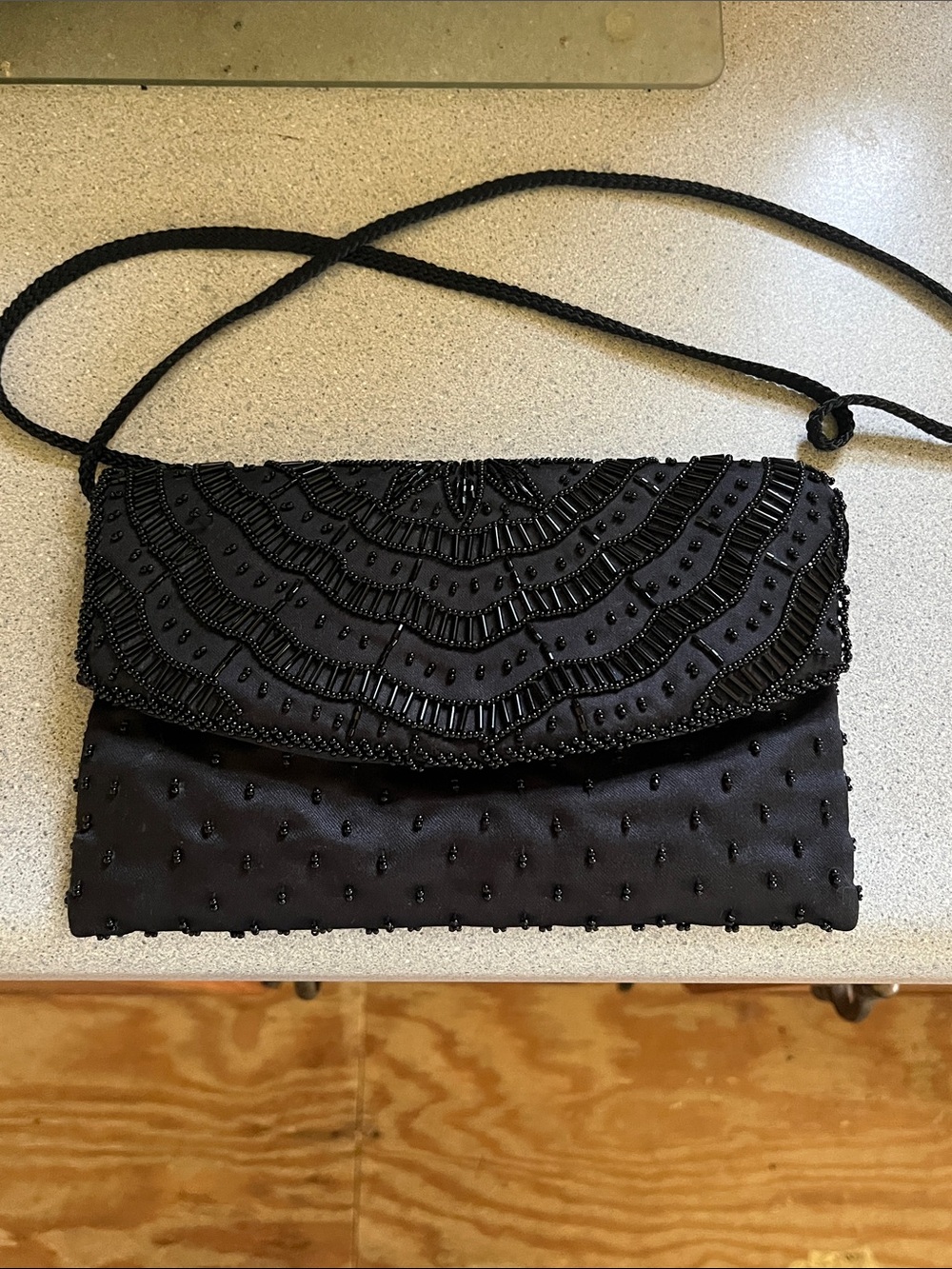 La Regale Black Beaded Fold-Over Clutch with Braided Strap